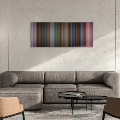 Dr. Seuss' How the Grinch Stole Christmas color palette canvas on a concrete wall above a gray sectional sofa