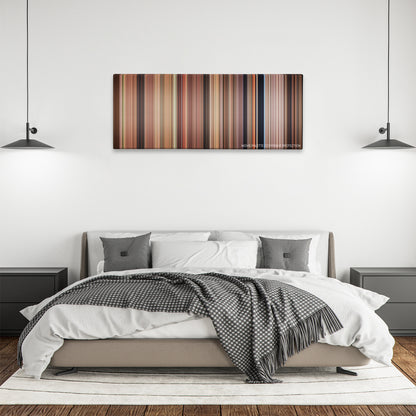 Father of the Bride color palette canvas above a bed, between two black pendant lamps