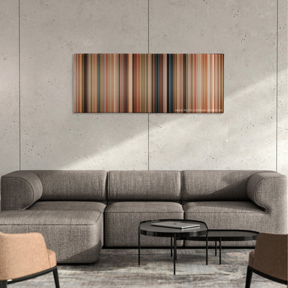 Hot Rod color palette canvas on a concrete wall above a gray sectional sofa