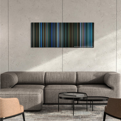 Watchmen color palette canvas on a concrete wall above a gray sectional sofa