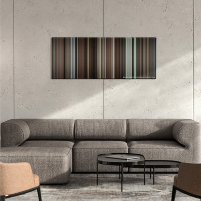 Knives Out color palette canvas on a concrete wall above a gray sectional sofa