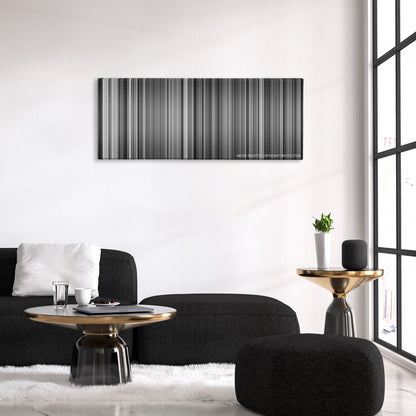Citizen Kane color palette canvas above a black sofa with a gold-topped table