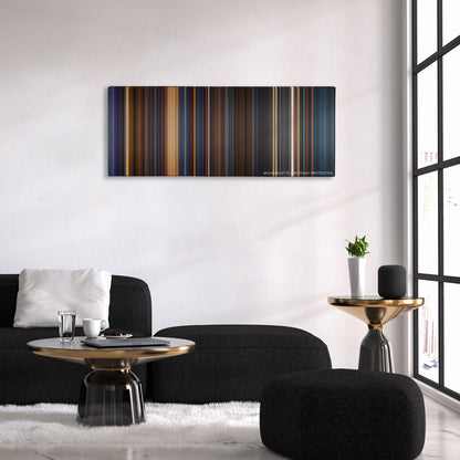 The Chronicles of Riddick color palette canvas above a black sofa with a gold-topped table