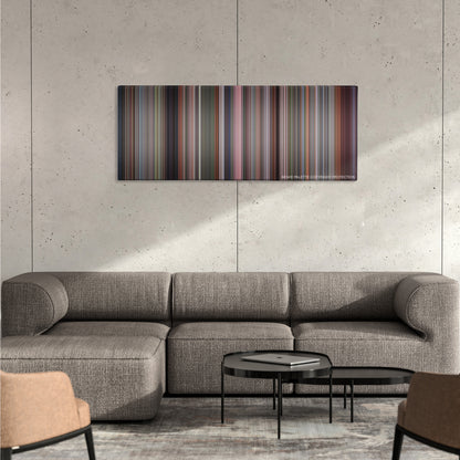 The Full Monty color palette canvas on a concrete wall above a gray sectional sofa