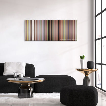 Borat color palette canvas above a black sofa with a gold-topped table