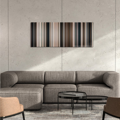 All the President's Men color palette canvas on a concrete wall above a gray sectional sofa