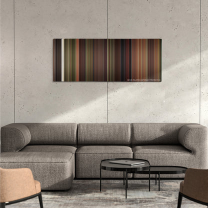 Robin Hood: Men in Tights color palette canvas on a concrete wall above a gray sectional sofa