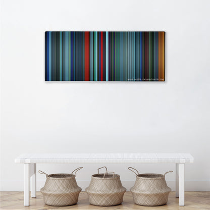 Atomic Blonde color palette canvas above a white bench with three woven baskets