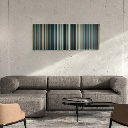 Man of Steel color palette canvas on a concrete wall above a gray sectional sofa