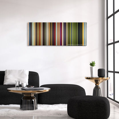 Raging Bull color palette canvas above a black sofa with a gold-topped table