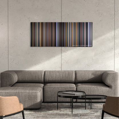Pink Floyd: The Wall color palette canvas on a concrete wall above a gray sectional sofa