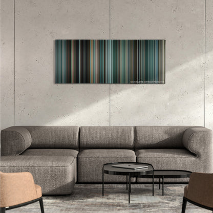 The Town color palette canvas on a concrete wall above a gray sectional sofa