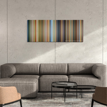 The Fox and the Hound color palette canvas on a concrete wall above a gray sectional sofa