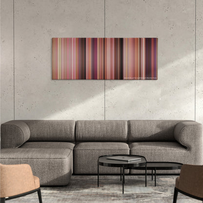 Mean Girls color palette canvas on a concrete wall above a gray sectional sofa