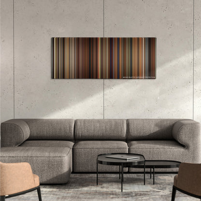 Walk the Line color palette canvas on a concrete wall above a gray sectional sofa