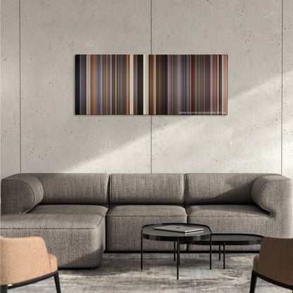 Spaceballs color palette canvas on a concrete wall above a gray sectional sofa