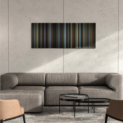 Carol color palette canvas on a concrete wall above a gray sectional sofa