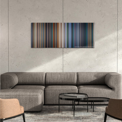 Independence Day color palette canvas on a concrete wall above a gray sectional sofa