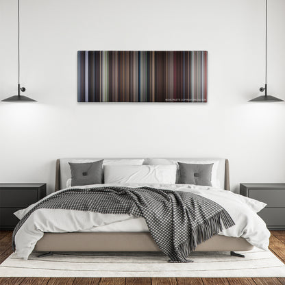 Elizabethtown color palette canvas above a bed, between two black pendant lamps