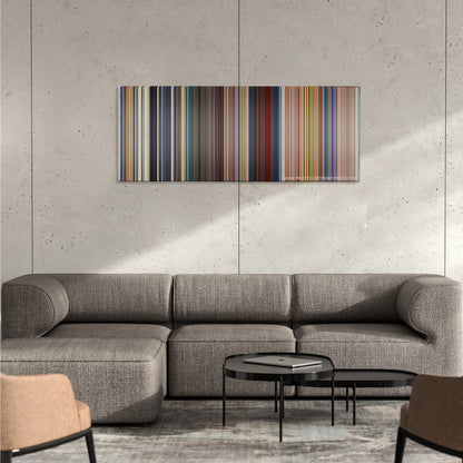 Megamind color palette canvas on a concrete wall above a gray sectional sofa
