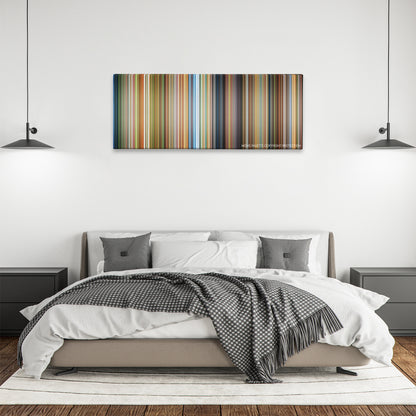 The Fox and the Hound color palette canvas above a bed, between two black pendant lamps