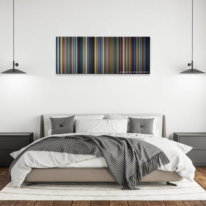 Three Colors: Blue color palette canvas above a bed, between two black pendant lamps