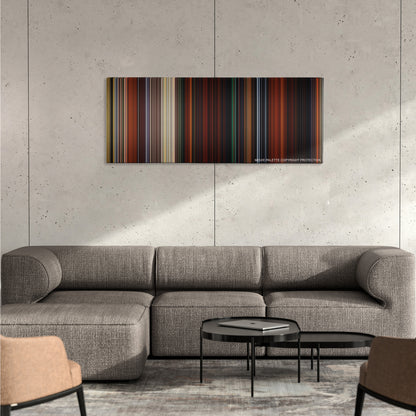 Brave color palette canvas on a concrete wall above a gray sectional sofa