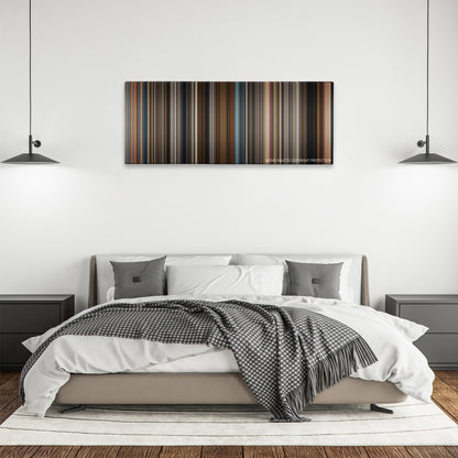 Prisoners color palette canvas above a bed, between two black pendant lamps