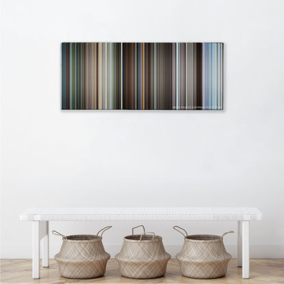 Monty Python and the Holy Grail color palette canvas above a white bench with three woven baskets