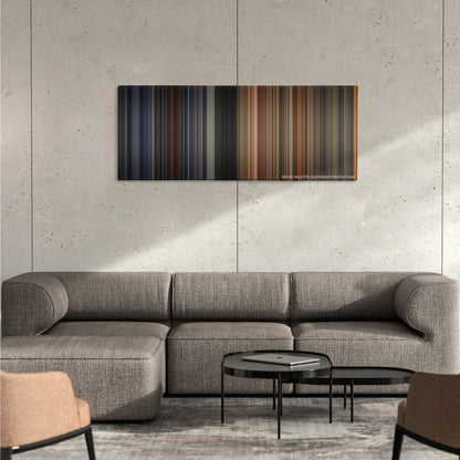 True Romance color palette canvas on a concrete wall above a gray sectional sofa