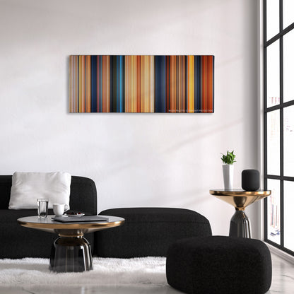 William Shakespeare's Romeo & Juliet color palette canvas above a black sofa with a gold-topped table