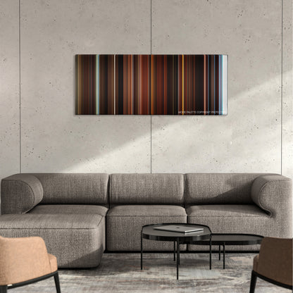 This Is the End color palette canvas on a concrete wall above a gray sectional sofa