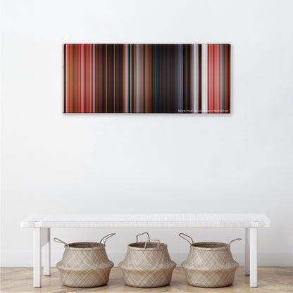 The Grand Budapest Hotel color palette canvas above a white bench with three woven baskets