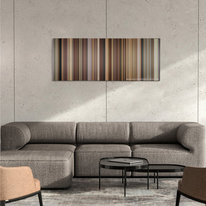 Evan Almighty color palette canvas on a concrete wall above a gray sectional sofa