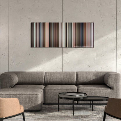 Crazy Rich Asians color palette canvas on a concrete wall above a gray sectional sofa