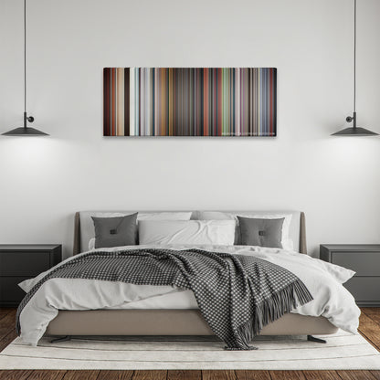Thor: Ragnarok color palette canvas above a bed, between two black pendant lamps