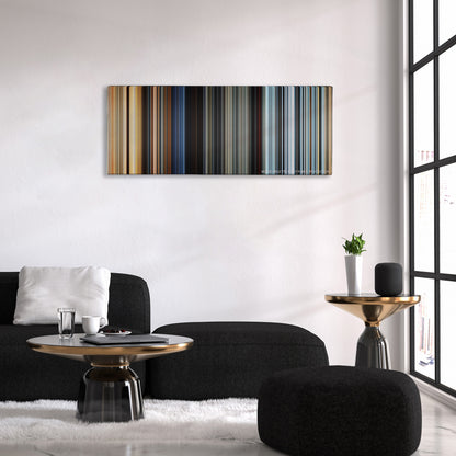 The Fate of the Furious color palette canvas above a black sofa with a gold-topped table