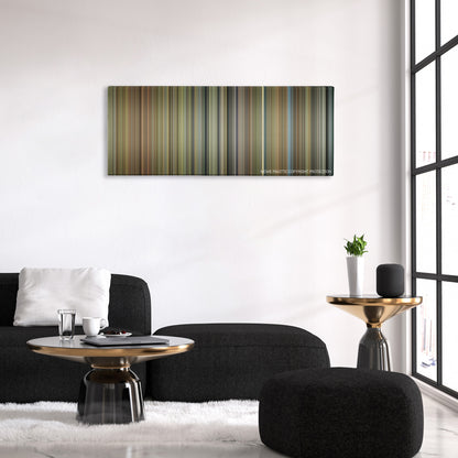 The Elephant Man color palette canvas above a black sofa with a gold-topped table