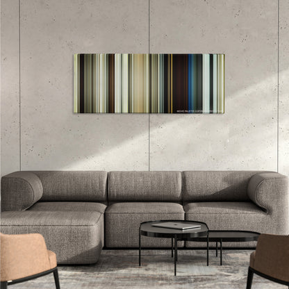 1917 color palette canvas on a concrete wall above a gray sectional sofa