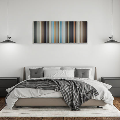 The Hangover color palette canvas above a bed, between two black pendant lamps