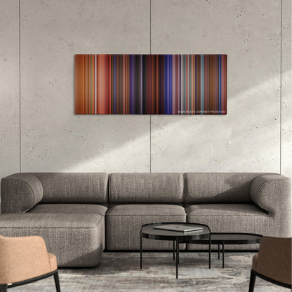 Once Upon a Time in the West color palette canvas on a concrete wall above a gray sectional sofa