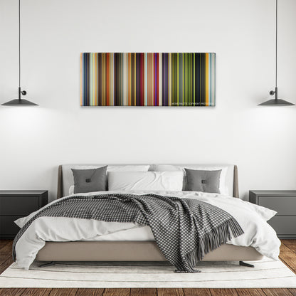 Raging Bull color palette canvas above a bed, between two black pendant lamps