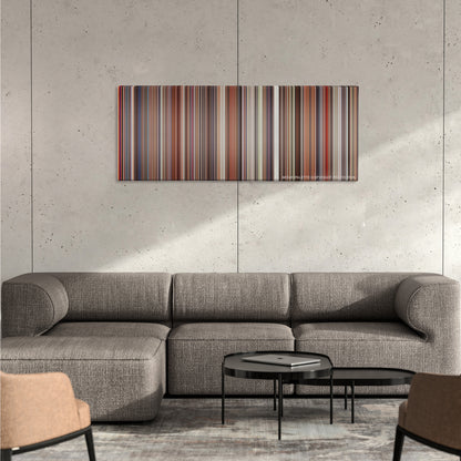 Casino color palette canvas on a concrete wall above a gray sectional sofa