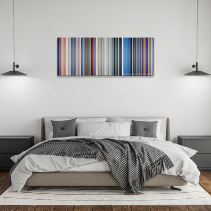 Monsters, Inc. color palette canvas above a bed, between two black pendant lamps