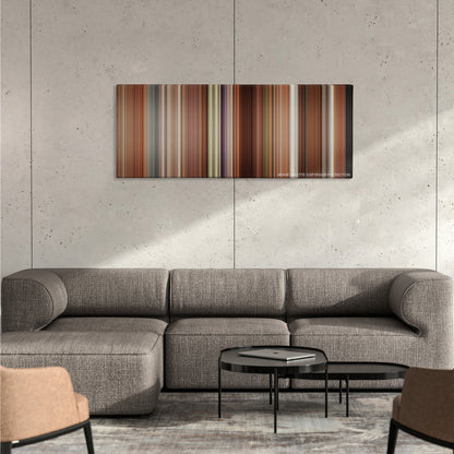 The Proposal color palette canvas on a concrete wall above a gray sectional sofa