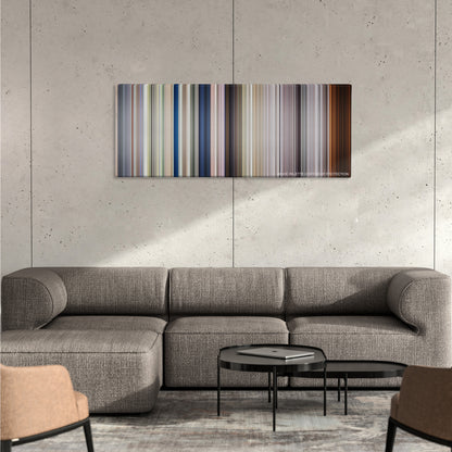 Full Metal Jacket color palette canvas on a concrete wall above a gray sectional sofa