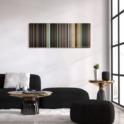Stardust color palette canvas above a black sofa with a gold-topped table