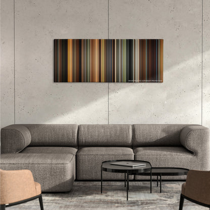 The Time Traveler's Wife color palette canvas on a concrete wall above a gray sectional sofa
