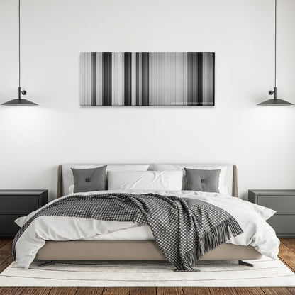 10 Cloverfield Lane color palette canvas above a bed, between two black pendant lamps