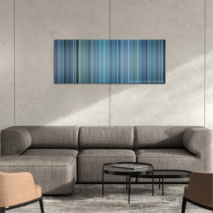 Escape Plan color palette canvas on a concrete wall above a gray sectional sofa